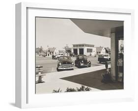 Levittown, N.Y. Corner Store across the Street from a Gas Station-null-Framed Photo