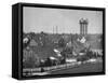 Levittown Water Tank Looming over Middle Class Homes in New Housing Development-Joe Scherschel-Framed Stretched Canvas