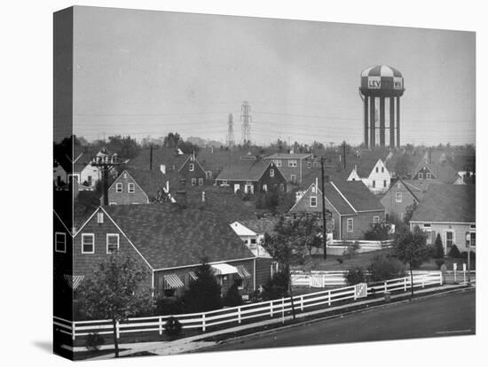 Levittown Water Tank Looming over Middle Class Homes in New Housing Development-Joe Scherschel-Stretched Canvas