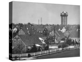 Levittown Water Tank Looming over Middle Class Homes in New Housing Development-Joe Scherschel-Stretched Canvas