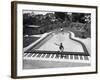 Liberace at the 'Piano' Shaped Pool in His Home-Loomis Dean-Framed Premium Photographic Print