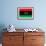 Libya Flag Design with Wood Patterning - Flags of the World Series-Philippe Hugonnard-Framed Art Print displayed on a wall