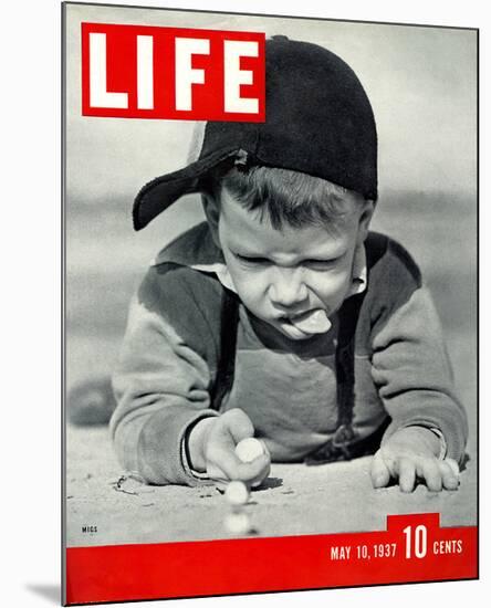 LIFE Boy playing marbles 1937-null-Mounted Art Print
