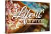 Life is Sweet - Rows of Candy Sentiment-Lantern Press-Stretched Canvas