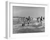 Lifeguards and Members of Womens Swimming Team Start Day by Charging into Surf-Peter Stackpole-Framed Photographic Print