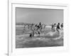 Lifeguards and Members of Womens Swimming Team Start Day by Charging into Surf-Peter Stackpole-Framed Photographic Print