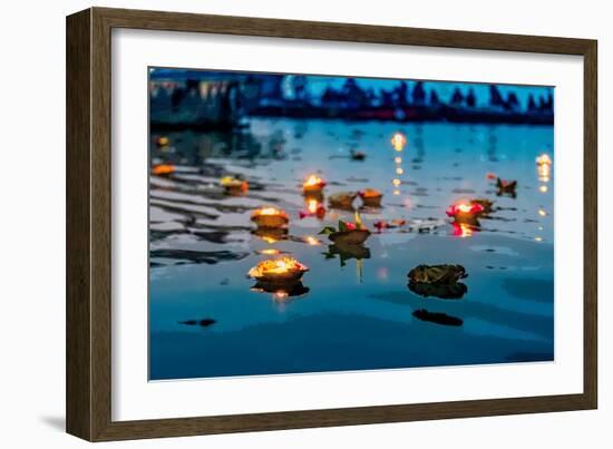 Light and Flower Offerings at Sunset on the River Ganges.-null-Framed Art Print