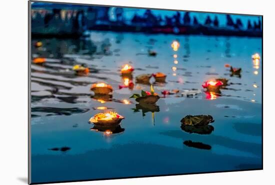 Light and Flower Offerings at Sunset on the River Ganges.-null-Mounted Art Print