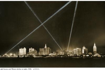 https://imgc.allpostersimages.com/img/posters/light-beams-and-the-miami-skyline-at-night-1926_u-L-PRC5JG0.jpg?artPerspective=n