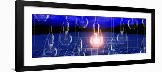 Light Bulb Lit Up over a Solar Panel-null-Framed Photographic Print