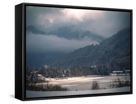 Light in the Winter Storm over Frozen Lake-Sheila Haddad-Framed Stretched Canvas