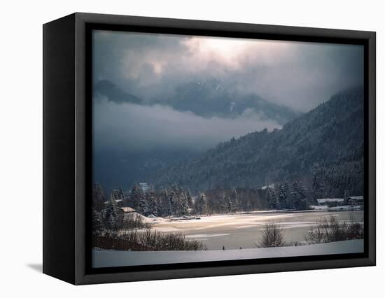 Light in the Winter Storm over Frozen Lake-Sheila Haddad-Framed Stretched Canvas