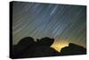 Light Pollution Illuminates the Sky and Star Tails Above Large Boulders-null-Stretched Canvas
