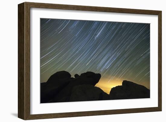 Light Pollution Illuminates the Sky and Star Tails Above Large Boulders-null-Framed Photographic Print