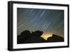 Light Pollution Illuminates the Sky and Star Tails Above Large Boulders-null-Framed Photographic Print