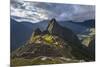 Light Streams Through The Clouds And Lights Parts Of The Ancient City Of Machu Picchu-Joe Azure-Mounted Photographic Print