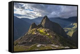 Light Streams Through The Clouds And Lights Parts Of The Ancient City Of Machu Picchu-Joe Azure-Framed Stretched Canvas