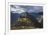 Light Streams Through The Clouds And Lights Parts Of The Ancient City Of Machu Picchu-Joe Azure-Framed Photographic Print