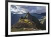 Light Streams Through The Clouds And Lights Parts Of The Ancient City Of Machu Picchu-Joe Azure-Framed Photographic Print