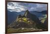 Light Streams Through The Clouds And Lights Parts Of The Ancient City Of Machu Picchu-Joe Azure-Framed Photographic Print