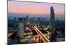 Light trails and skyscrapers at dusk, Bangkok, Thailand, Southeast Asia, Asia-Logan Brown-Mounted Photographic Print