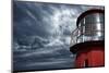 Lighthouse against  Stormy Sky.-NejroN Photo-Mounted Photographic Print