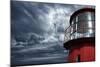 Lighthouse against  Stormy Sky.-NejroN Photo-Mounted Photographic Print