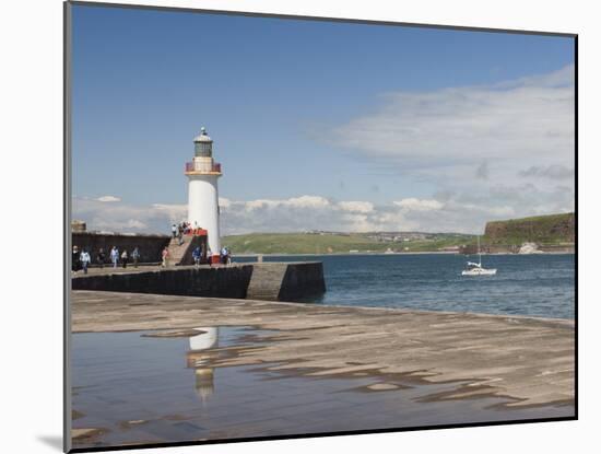 Lighthouse at Entrance to Outer Harbour, Motor Yacht Entering, Whitehaven, Cumbria, England, UK-James Emmerson-Mounted Photographic Print