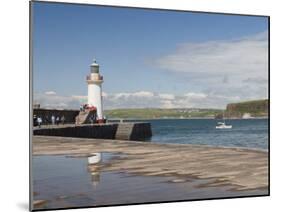 Lighthouse at Entrance to Outer Harbour, Motor Yacht Entering, Whitehaven, Cumbria, England, UK-James Emmerson-Mounted Photographic Print