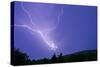 Lightning and Thunder Clouds over Woodland at Night-null-Stretched Canvas