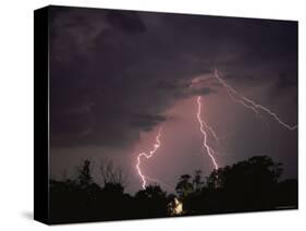 Lightning Over Floodlit Building, Pusztaszer, Hungary-Bence Mate-Stretched Canvas