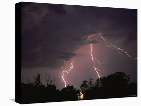 Lightning Over Floodlit Building, Pusztaszer, Hungary-Bence Mate-Stretched Canvas