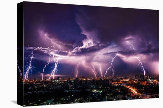 Lightning Storm over City in Purple Light-Vasin Lee-Stretched Canvas