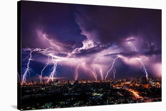 Lightning Storm over City in Purple Light-Vasin Lee-Stretched Canvas