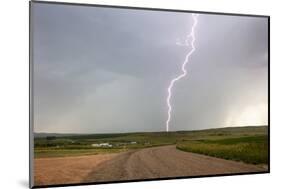 Lightning strike in rural Richland County, Montana, USA-Chuck Haney-Mounted Photographic Print