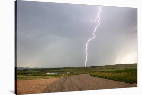 Lightning strike in rural Richland County, Montana, USA-Chuck Haney-Stretched Canvas