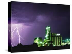 Lightning Striking near Factory in Texas-Paul Souders-Stretched Canvas