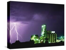 Lightning Striking near Factory in Texas-Paul Souders-Stretched Canvas