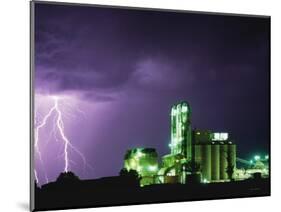 Lightning Striking near Factory in Texas-Paul Souders-Mounted Photographic Print