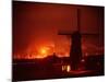 Lights and Fires of Pernis Refinery Glowing Behind Silhouetted Windmill-Ralph Crane-Mounted Photographic Print