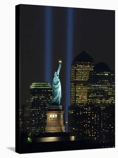 Lights from the Former World Trade Center Site Can be Seen on Both Sides of the Statue of Liberty-null-Stretched Canvas