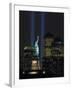 Lights from the Former World Trade Center Site Can be Seen on Both Sides of the Statue of Liberty-null-Framed Premium Photographic Print