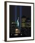 Lights from the Former World Trade Center Site Can be Seen on Both Sides of the Statue of Liberty-null-Framed Premium Photographic Print