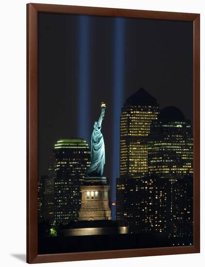 Lights from the Former World Trade Center Site Can be Seen on Both Sides of the Statue of Liberty-null-Framed Photographic Print