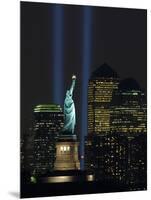Lights from the Former World Trade Center Site Can be Seen on Both Sides of the Statue of Liberty-null-Mounted Photographic Print