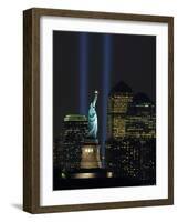 Lights from the Former World Trade Center Site Can be Seen on Both Sides of the Statue of Liberty-null-Framed Photographic Print