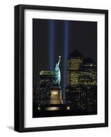 Lights from the Former World Trade Center Site Can be Seen on Both Sides of the Statue of Liberty-null-Framed Photographic Print