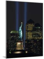 Lights from the Former World Trade Center Site Can be Seen on Both Sides of the Statue of Liberty-null-Mounted Photographic Print