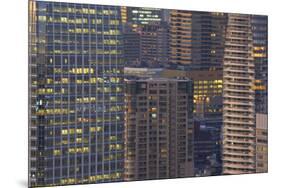 Lights on in city buidlings-Ben Simmons-Mounted Photo