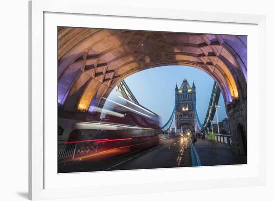 Lights on Tower Bridge over the River Thames with a typical double decker bus, London, England, Uni-Roberto Moiola-Framed Photographic Print